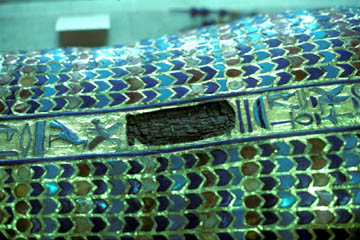 Detail of the coffin showing the deliberately hacked out cartouche which might have contained the name of Akhenaton.