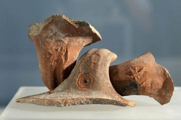 These pot handles discovered by Mazar are said to be inscribed 'lmlk' or 'for the king'.
