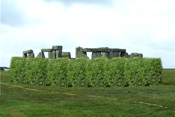 Is this what Stonehenge may have looked like in the Bronze Age? (An artist's reconstruction of Stonehenge surrounded by a high hedge.)