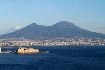 The Bay of Naples and Vesuvius. The modern summit is to the right, Monte Somma is on the left.