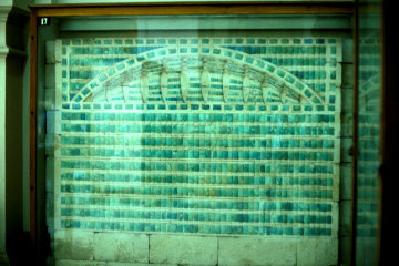 A section of tiles from the tunnels of the Step Pyramid. Note the arc of <i>heb sed</i> pillars at the top.