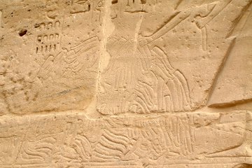 A scribe counts a waist-high pile of proofs that the enemy is dead.