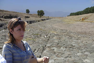 Steffania, our guide at Sybaris, in front of the start of the Appian Way.