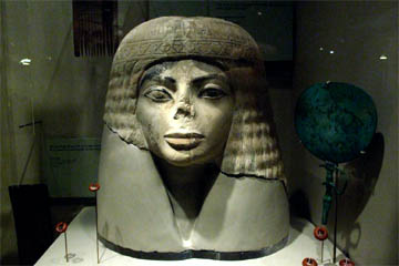 The head of an unknown Egyptian woman, part of a sarcophagus, now in the Chicago Field Museum.