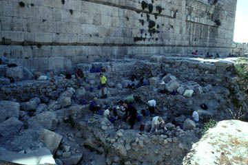 The Diggings team excavates at the Western Wall in Jerusalem among the blocks of stone from the temple.